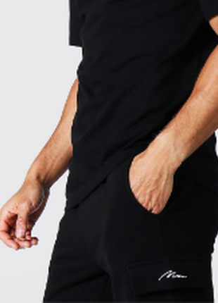 Чоловічі шорти однотонні boohooman, розмір m, чорний2 фото