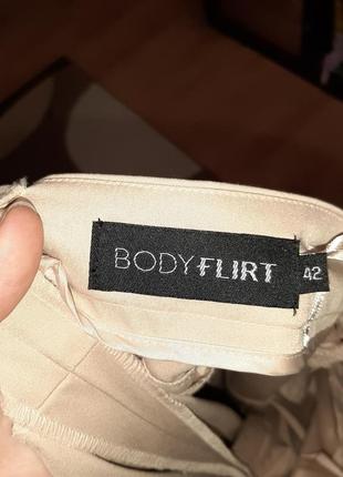 Стильні уласичні штани знизу на ризинках bodyflirt3 фото
