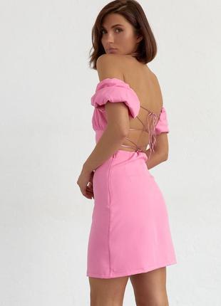 Женское короткое платье со шнуровкой на спине.10 фото