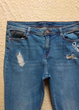 Стильные джинсы бойфренды с вышивкой и необработаным низом orsay, 12 размер.2 фото