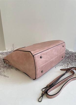 Розовая женская сумка деловая на плечо из эко кожи на металлических ножках ножках.3 фото