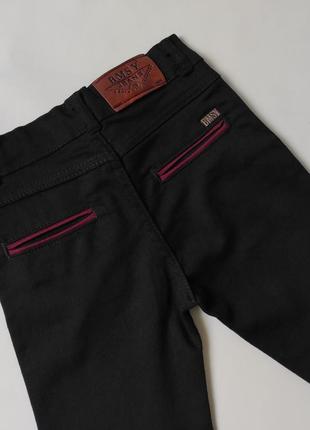 Классические брюки с бордовыми вставками4 фото