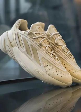 Демисезонное бежевое кроссовки adidas ozelia бежевые женские оригинальные кроссовки adidas ozelia оригинал адидас7 фото