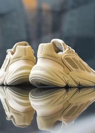 Демисезонное бежевое кроссовки adidas ozelia бежевые женские оригинальные кроссовки adidas ozelia оригинал адидас8 фото