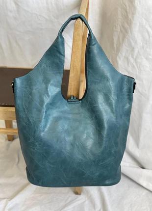 Блакитна жіноча сумка шопер для покупок з косметичкою з еко шкіри.6 фото