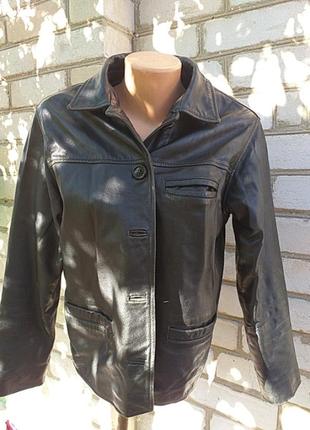 Женский кожаний пиджак.