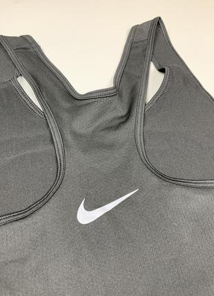 Жіноча спортивна майка nike tank dri-fit7 фото