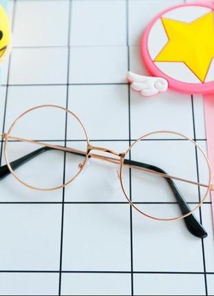 Іміджеві круглі окуляри / нульовки унісекс в оправі рожеве золото1 фото