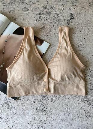 Безшовний бежевий топ застібка спереду