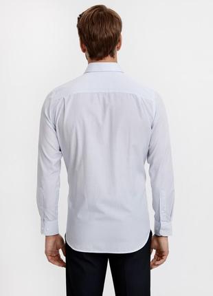 Белая мужская рубашка lc waikiki в мелкие синие листики, с карманом4 фото
