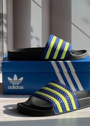 Оригінальні зручні стильні шльопки adidas