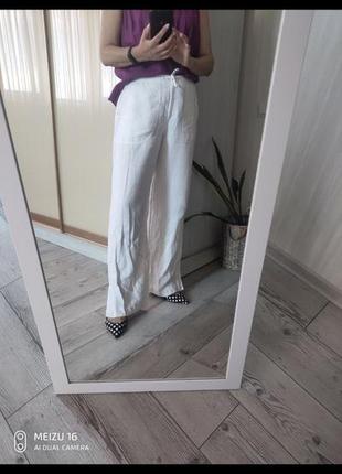 Льняные брюки палаццо с разрезами и вышивкой4 фото