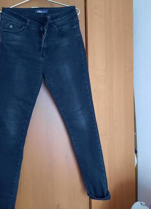 Черные утепленные джинсы1 фото