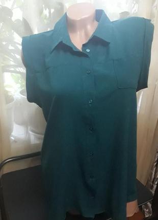 Легкая, яркая, фирменная блузка насыщенного цвета.