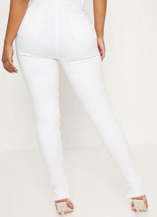 Ідеальні білі еластичні джинси скінні на дуже високій посадці з необробленим низом4 фото
