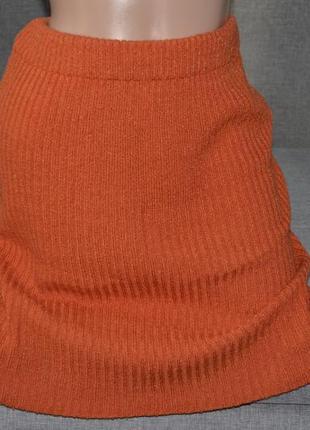 Теплая вязаная оранжевая юбочка