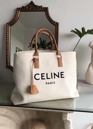 Бежевая текстильная сумка с надписью в стиле celine