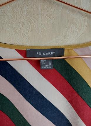 Стильна блуза в смужку рукава кльош9 фото