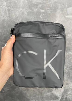 Чоловіча сумка на через плече calvin klein барсетка придбати