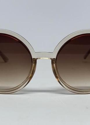 Очки женские солнцезащитные коричневый градиент в бежевой прозрачной оправе круглые2 фото