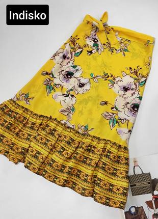 Юбка миди женского желтого цвета в цветочный принт на запах с оборками от бренда indiska m