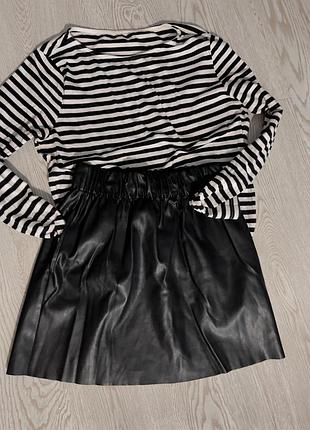 Юбка из кожзама с карманами