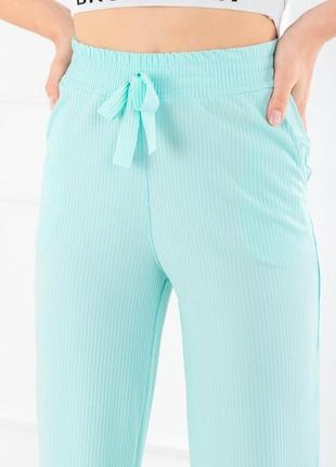 Женские бирюзовые брюки палаццо3 фото