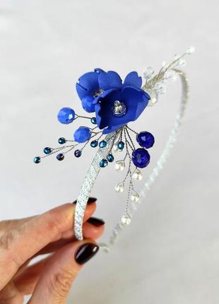 Обруч із синіми квітами для дівчинки1 фото