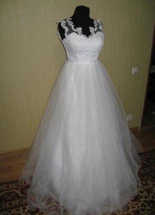 Весільну сукню. розмір 46-48. регулюється шнурівкою. на ріст 175-1854 фото