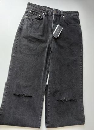 Кружевные джинсы stradivarius фасон straight fit с разрезами на коленях. оригинад из испании
