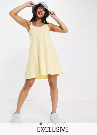 Легкое летнее лимонное платье на бретелях1 фото