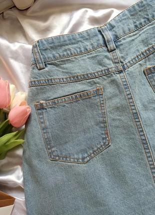 Джинсовая мини юбка с потертостями голубая6 фото