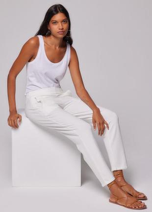 Женские белые брюки из льна\h&amp;m\свободный крой, зауженные снизу\р.l1 фото
