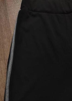 Брюки брюки с эластичной талией и боковыми полосами серебристыми лампасами3 фото