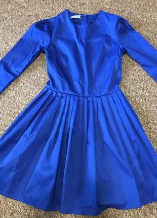 Темно синє платтячко, розмір 42. можна носити з поясом, можна без. в гарному стані.