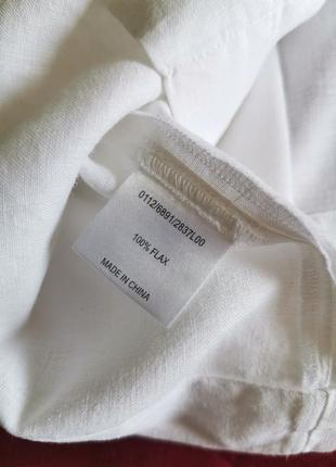 Біла блузка з гудзиками на спині4 фото