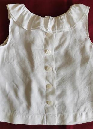 Біла блузка з гудзиками на спині2 фото