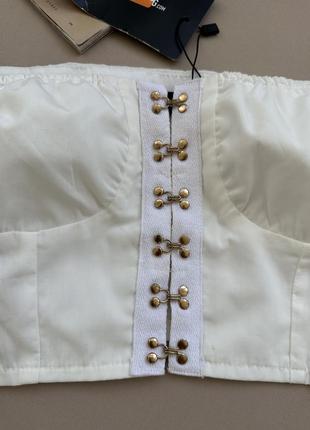 Укороченная блузка топ на крючках с объемными рукавами9 фото