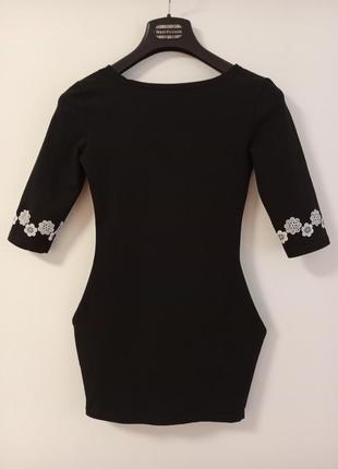 Туника мини-платье чёрное с узором.2 фото