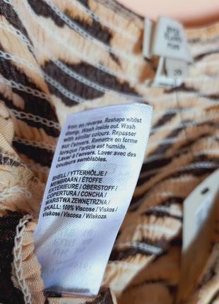 Бежевый натуральный брючный комбинезон в тигровый украшение, комбинезон 54-56 р.8 фото