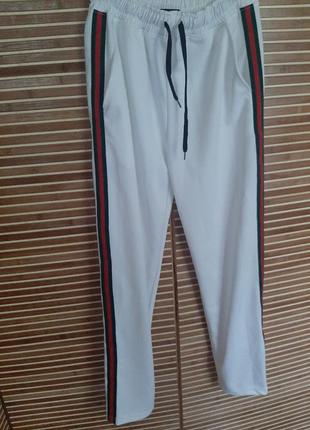 Спортивні штани з лампасами3 фото
