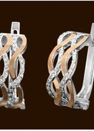 Стильні срібні сережки з золотими напайками2 фото