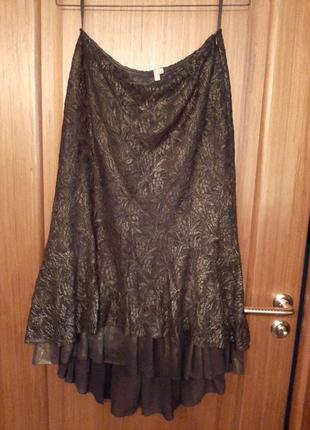 Нарядна модна мереживна багатошарова спідниця з асиметричним кроєм