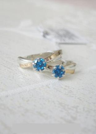 Стильные серебряные серьги с золотыми напайками