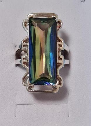 Серебряное кольцо с большим голубым топазом.