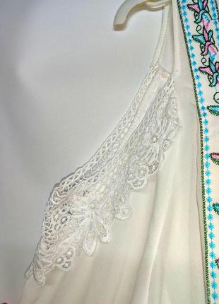 Классная белоснежная шифоновая блуза интересного кроя.4 фото