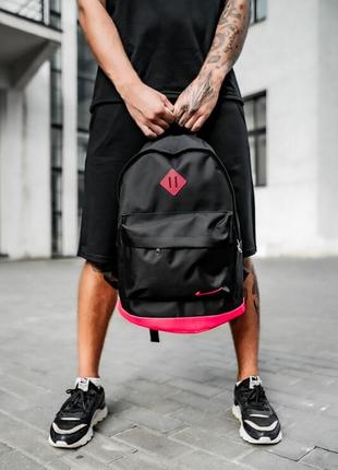 Рюкзак унісекс чорний з рожевим дном з екошкіри с лого nike1 фото