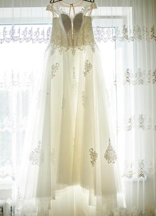 Ніжна весільна сукня кольору айворі2 фото
