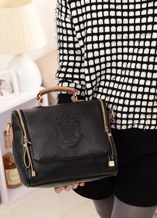 Красивая  и вместительная женская сумочка  черного цвета7 фото