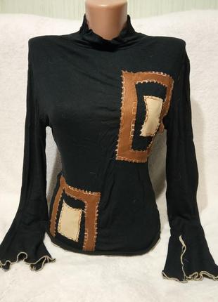 Стильный, трикотажный гольф с замшевыми аппликациями. раз.укр.46-48